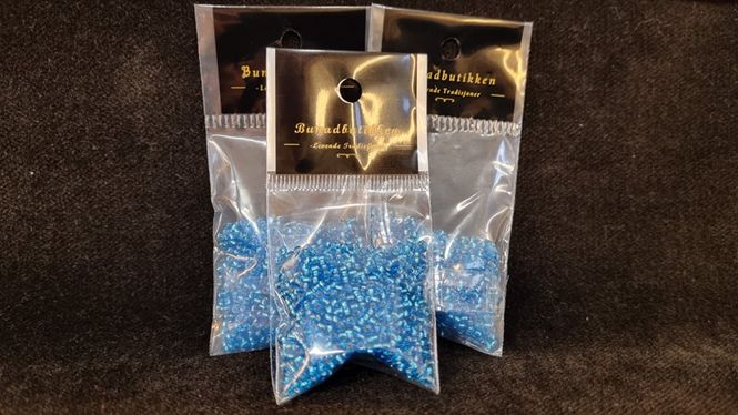 Hovedbilde 23B Lys blå transp. med shimmer